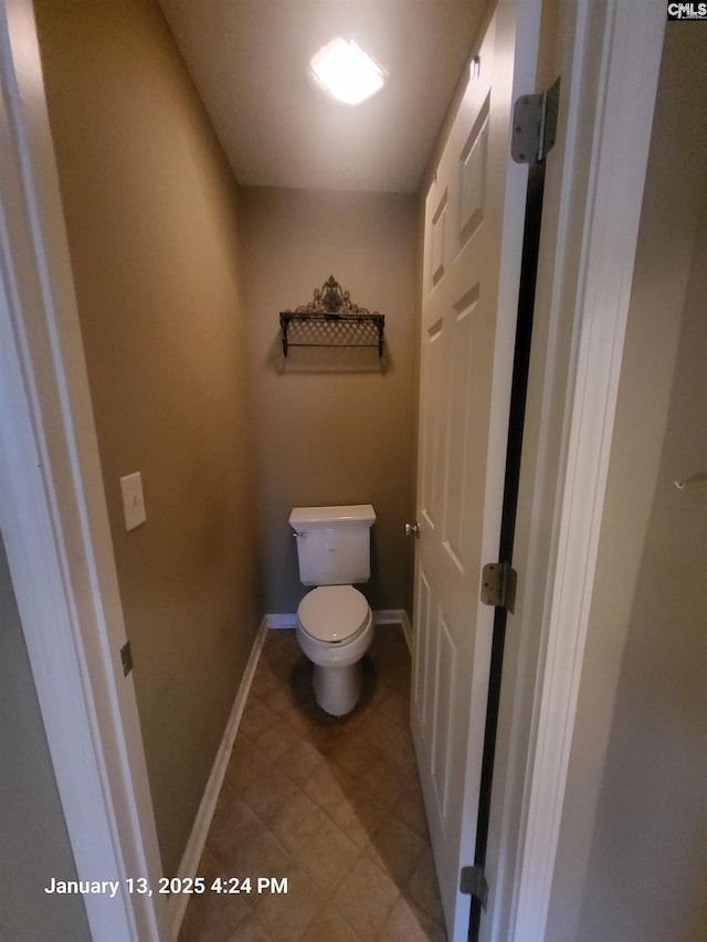 bathroom featuring toilet