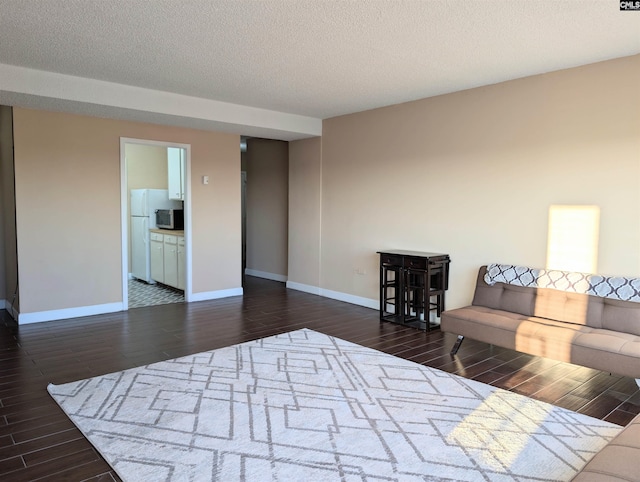 living room featuring a textured ceiling