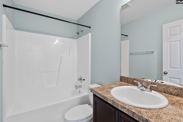 full bathroom featuring shower / bathtub combination, vanity, and toilet