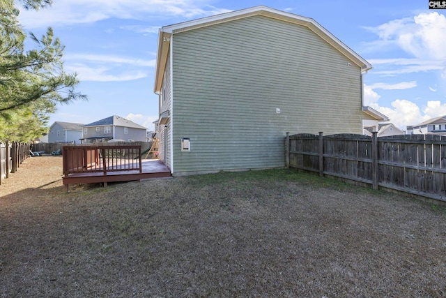 view of home's exterior with a deck