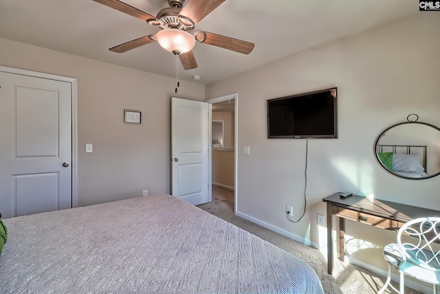 unfurnished bedroom with ceiling fan and light carpet