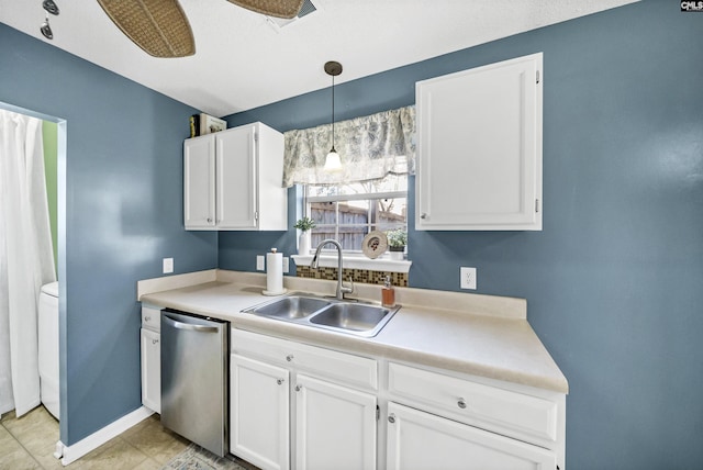 kitchen with white cabinets, sink, decorative light fixtures, stainless steel dishwasher, and light tile patterned flooring