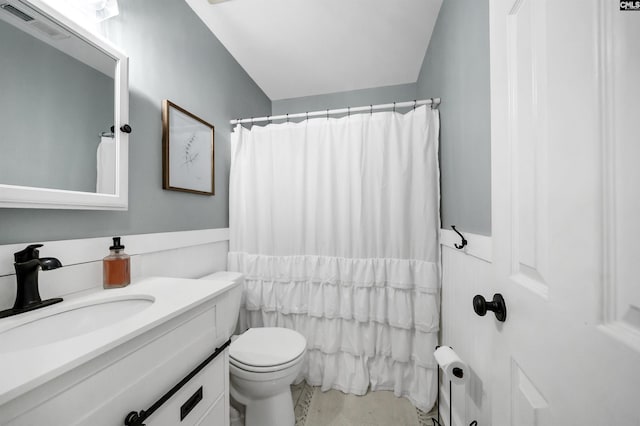 bathroom with a shower with shower curtain, radiator heating unit, vanity, and toilet