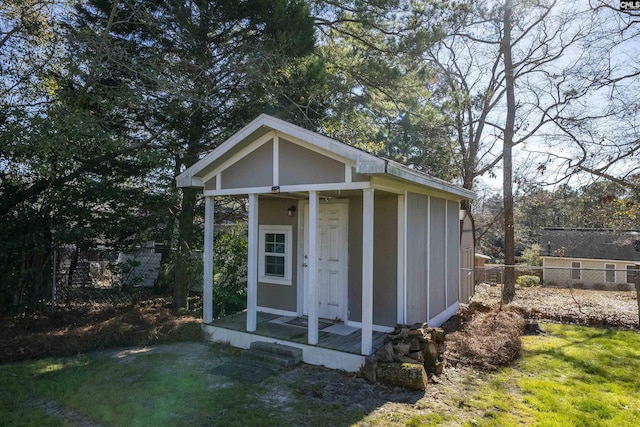 view of outdoor structure featuring a lawn