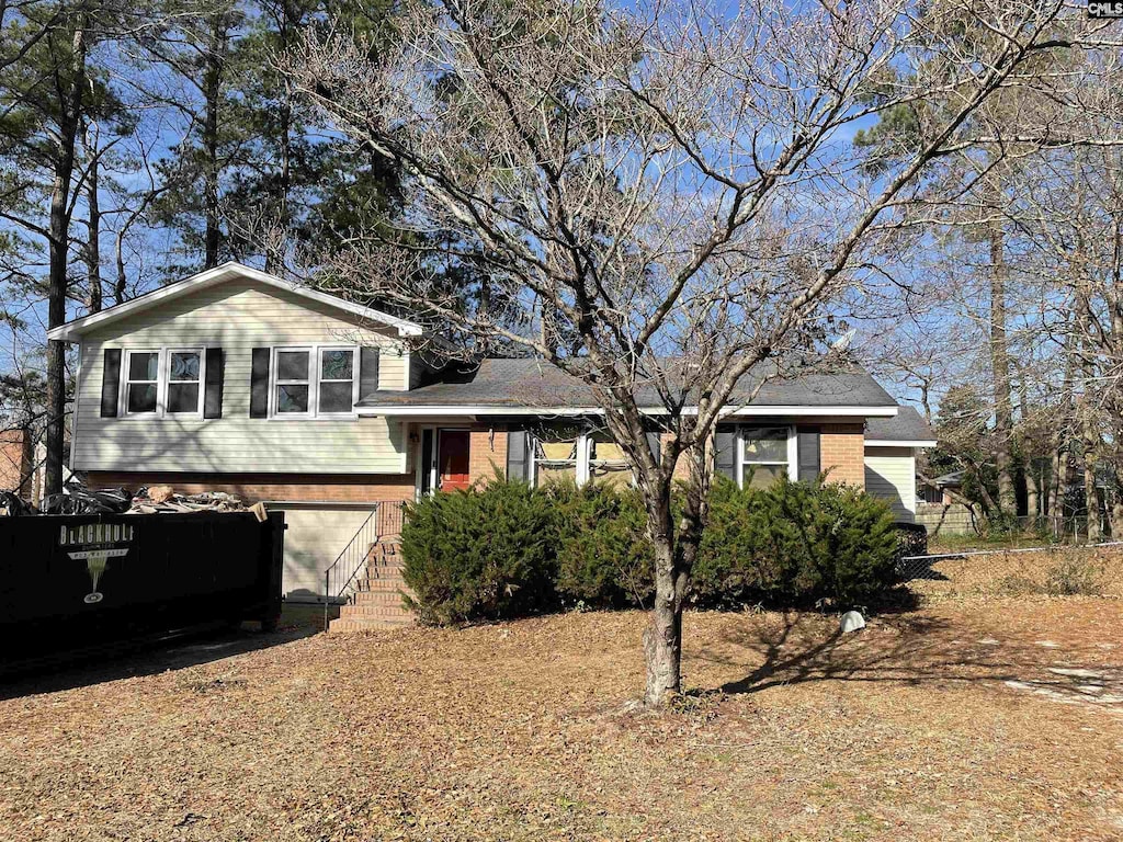 split level home with a garage