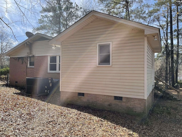 view of side of property featuring cooling unit