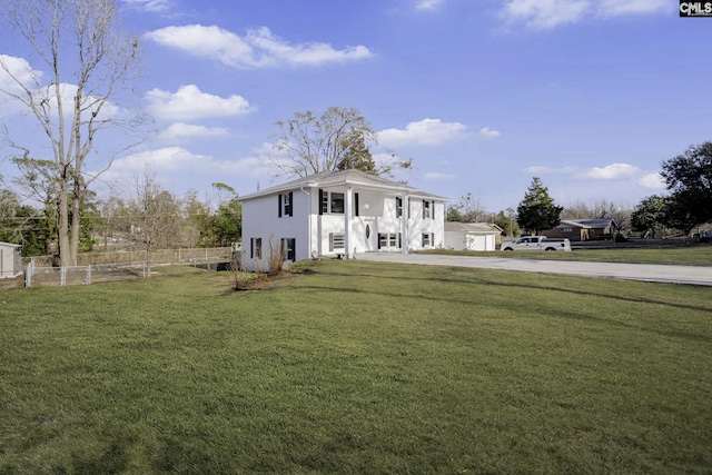 view of front of home with a front yard