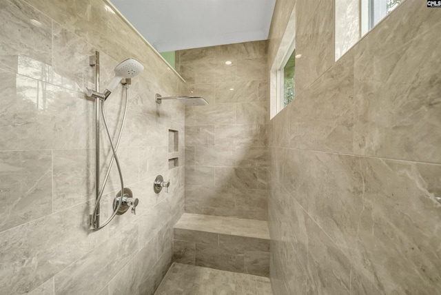 interior space featuring a tile shower