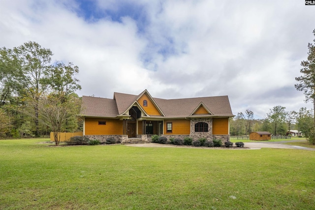 craftsman-style home with a front lawn