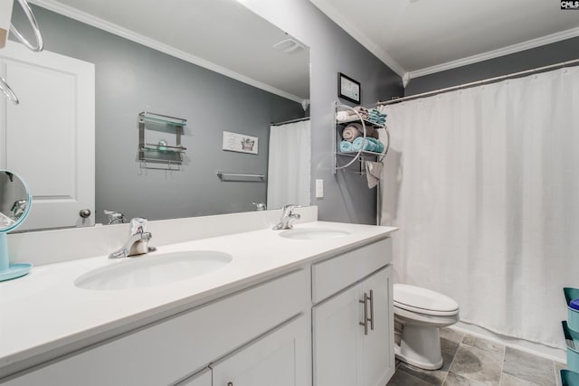 bathroom with toilet, crown molding, and vanity