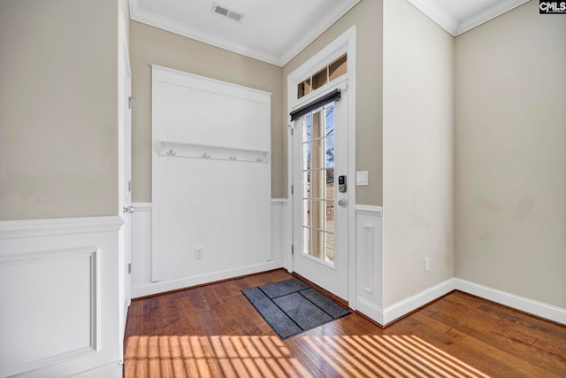 foyer featuring crown molding and dark hardwood / wood-style floors