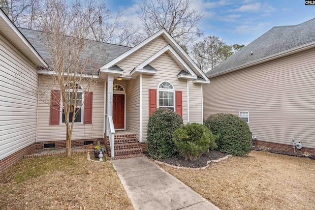 exterior space with a front lawn