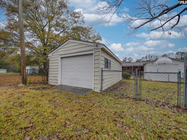 garage with a lawn