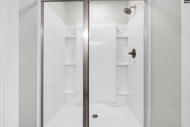 bathroom featuring an enclosed shower