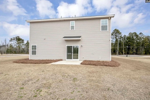 rear view of property with a patio area