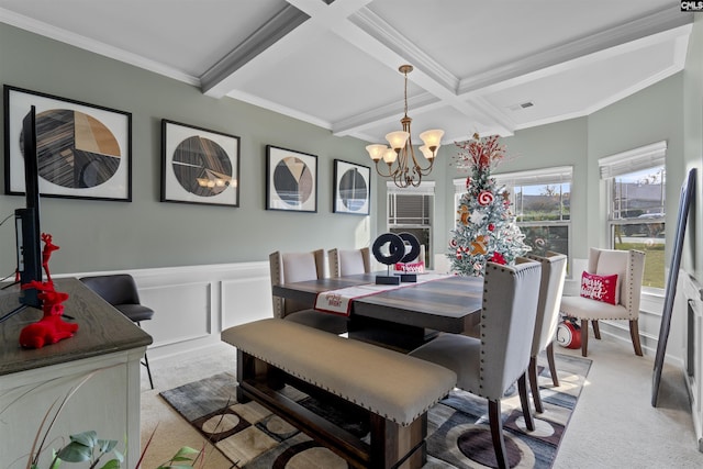 carpeted dining area featuring coffered ceiling, an inviting chandelier, ornamental molding, and beam ceiling