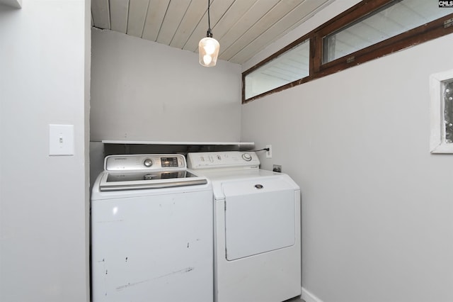 washroom with independent washer and dryer and wooden ceiling