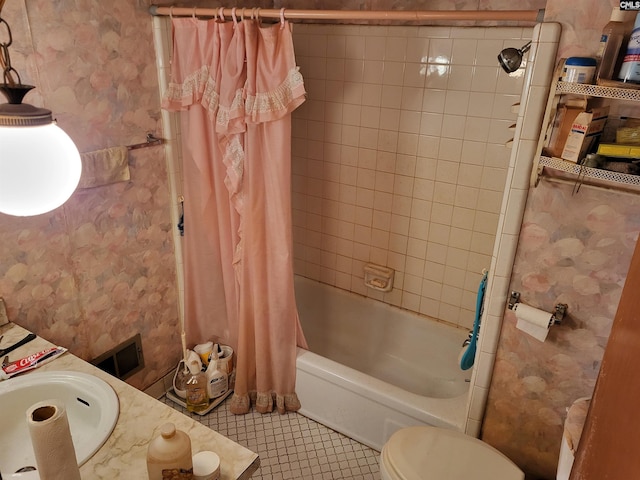 full bathroom featuring sink, shower / tub combo, tile patterned flooring, and toilet