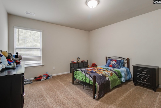 bedroom featuring carpet