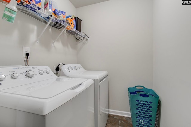 laundry room with washing machine and dryer