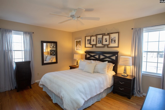 bedroom featuring ceiling fan and hardwood / wood-style floors