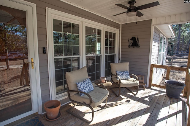 wooden terrace with ceiling fan