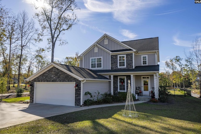 view of front of house with a front lawn and a garage