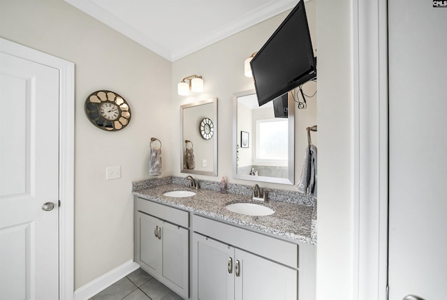 bathroom featuring ornamental molding, tile patterned flooring, and vanity