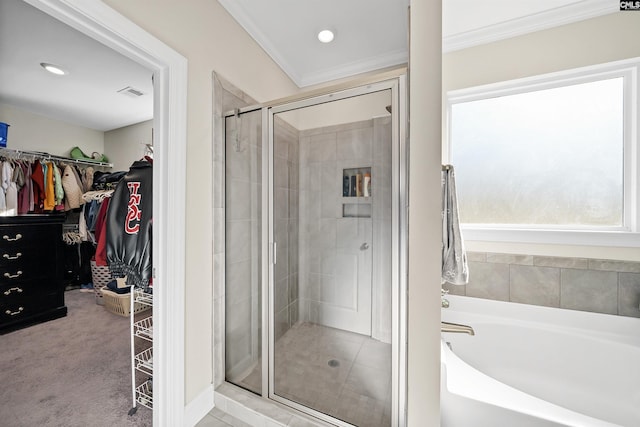 bathroom featuring crown molding and plus walk in shower