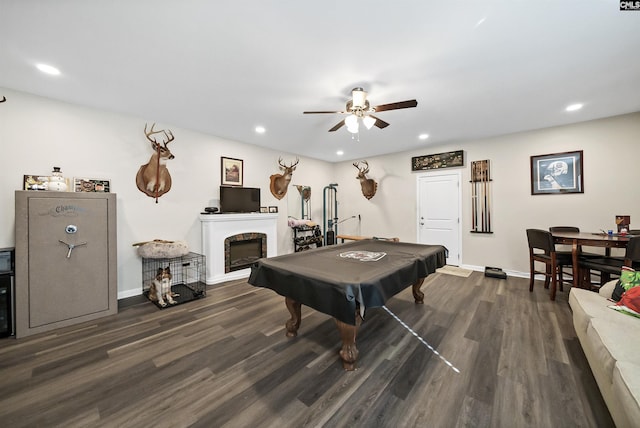 rec room with pool table, ceiling fan, and dark wood-type flooring