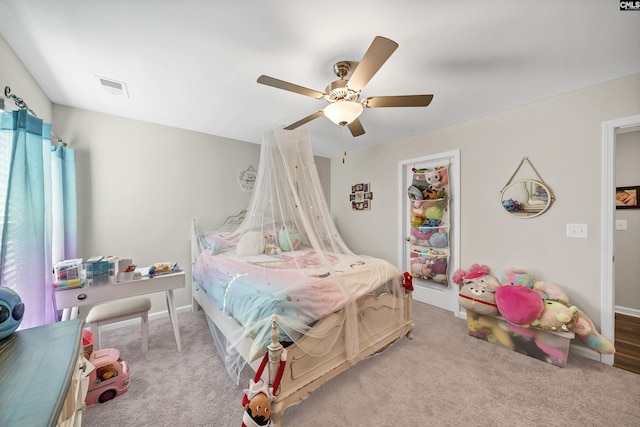 carpeted bedroom with ceiling fan