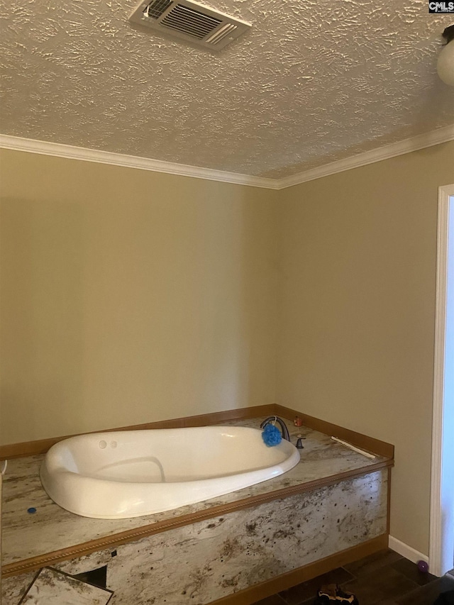 bathroom featuring a bathing tub and crown molding