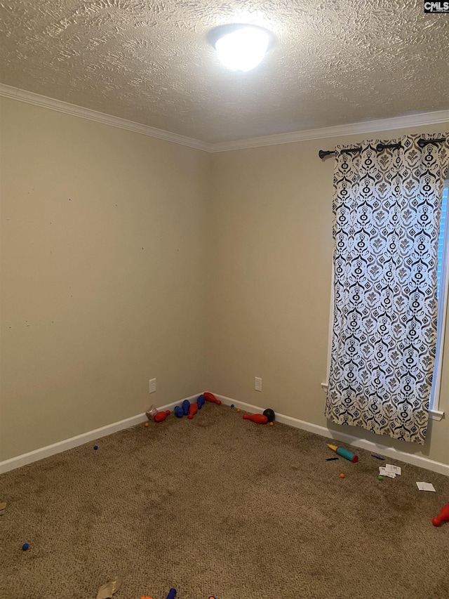 unfurnished room with a textured ceiling, crown molding, and carpet floors