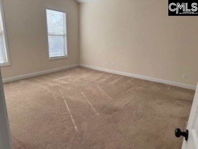 empty room with carpet floors