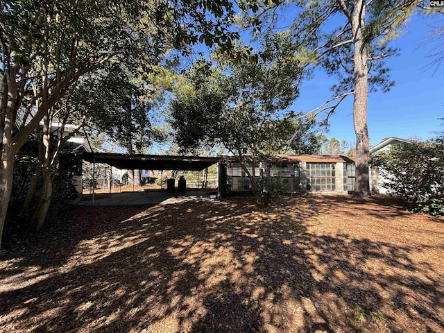 back of property featuring an outdoor structure