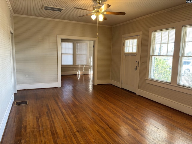 entrance foyer featuring ornamental molding, ceiling fan, and dark hardwood / wood-style flooring