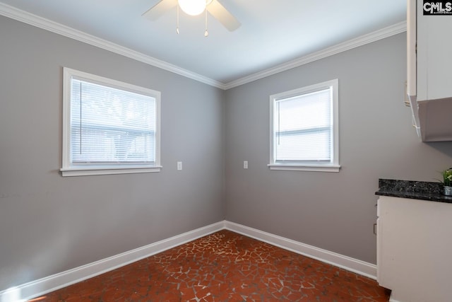 unfurnished room featuring ornamental molding, ceiling fan, and plenty of natural light