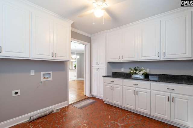 kitchen featuring ceiling fan, white cabinetry, and crown molding