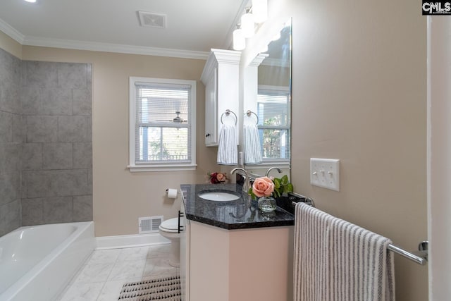 bathroom featuring toilet, crown molding, and vanity