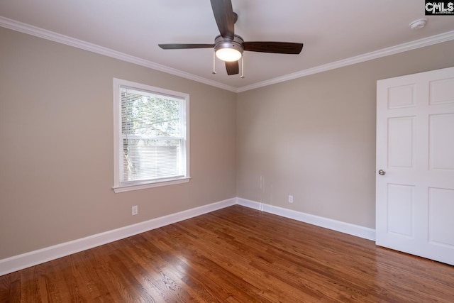 empty room featuring ceiling fan, ornamental molding, and hardwood / wood-style floors