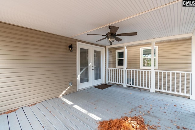 deck featuring ceiling fan and french doors