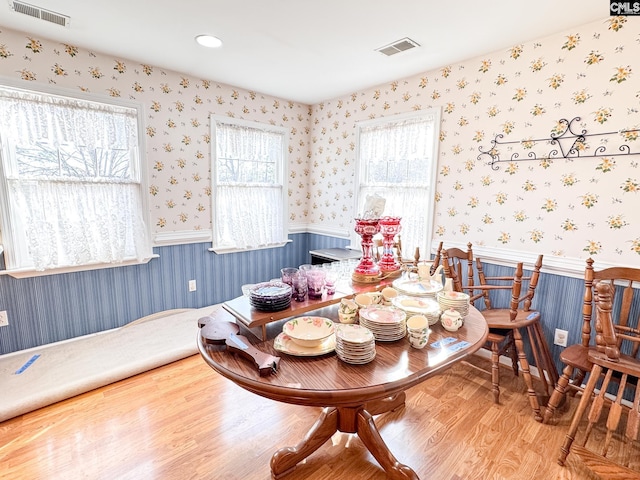 dining area with wood-type flooring