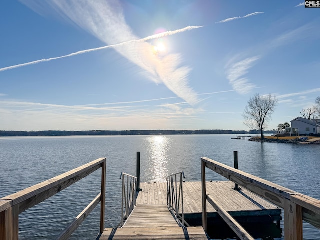 view of dock with a water view