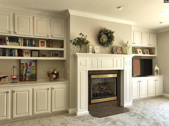 living room with light colored carpet, a tile fireplace, and crown molding