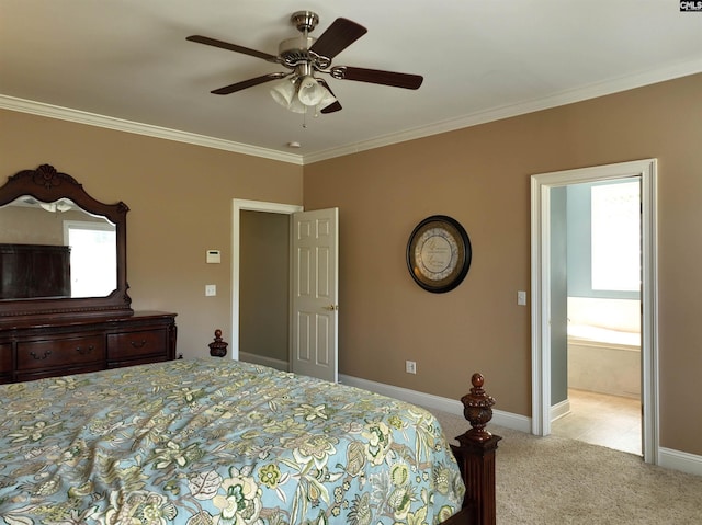 carpeted bedroom featuring ensuite bathroom, ceiling fan, and crown molding