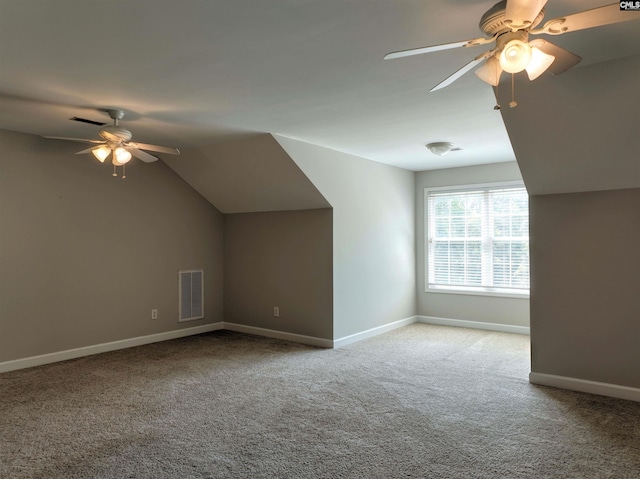 bonus room featuring vaulted ceiling, ceiling fan, and light carpet