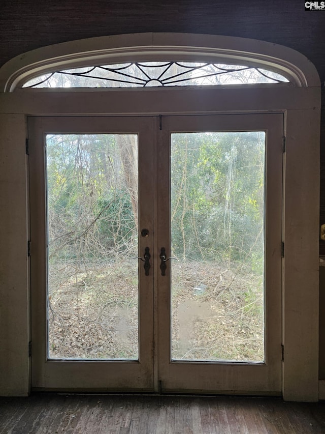 doorway featuring french doors and hardwood / wood-style flooring