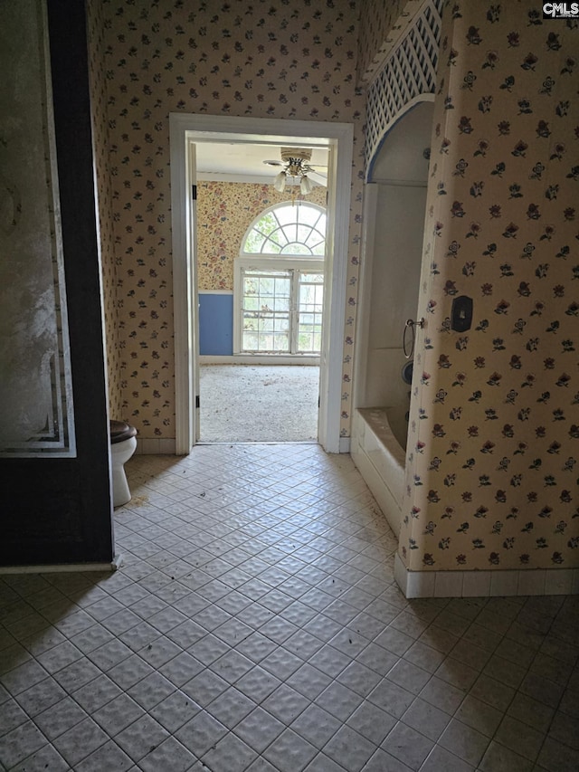 hallway with light tile patterned floors