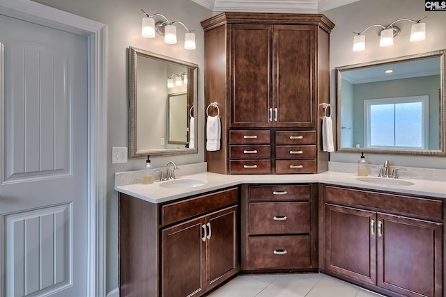 bathroom with vanity, tile patterned floors, and ornamental molding