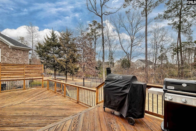 wooden deck featuring grilling area